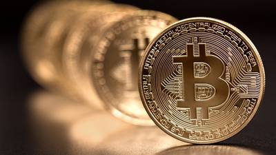 Bitcoin slides 14% on crackdown fears, hits four-week low