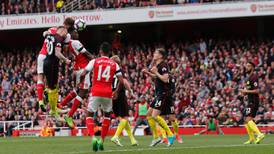 Arsenal and Man City share spoils as frenetic clash peters out