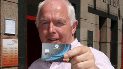 Central Bank threatens to delay credit union debit cards