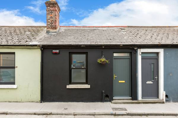 Restored artisan cottage with ‘magically private’ backyard on Meath Street