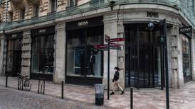 Hugo Boss expects virus hit to worsen before recovery