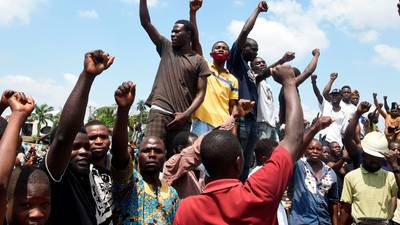 Nigerian president calls for end to street protests as violence escalates in Lagos