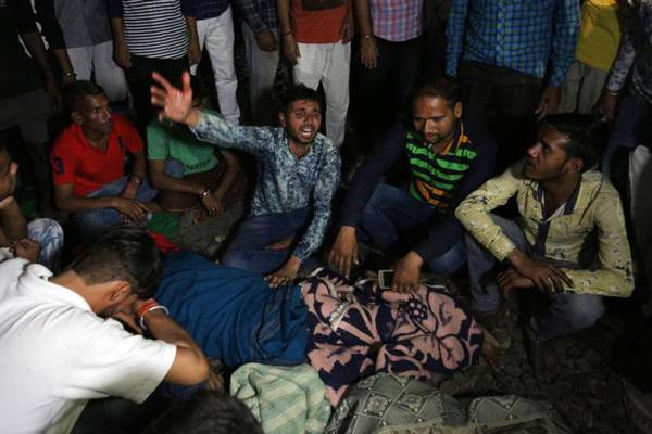 At least 59 killed as train hits crowd in northern India