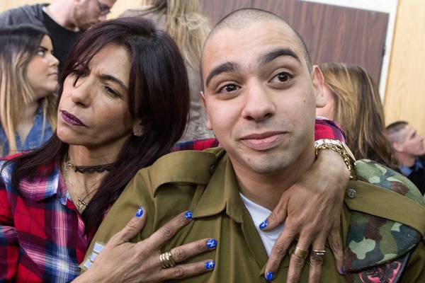 Israeli soldier gets  18 months for killing injured Palestinian attacker