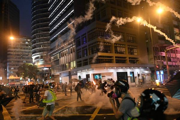 Further arrests in Hong Kong as massive parade planned for Tuesday