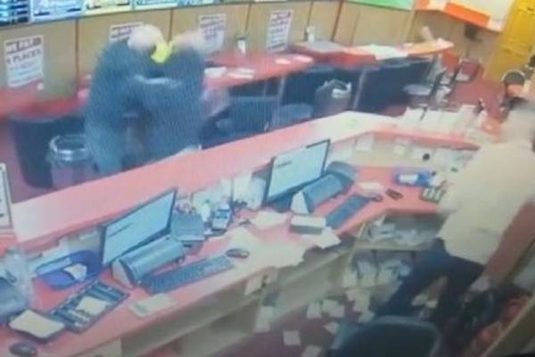 Men released without charge after questioning about raid on bookmakers