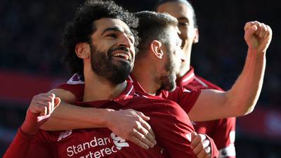 Formidable Liverpool go top after comfortable Cardiff win