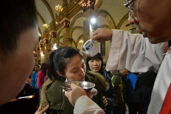 China's Catholics pray as Communist Party and Holy See lock horns