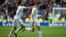 Barcelona slump to defeat as Gareth Bale helps lift Real Madrid to top