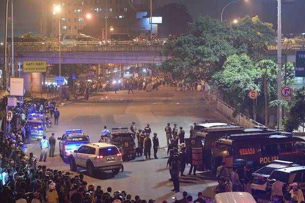 Suspected suicide bombers kill  police officers in Jakarta