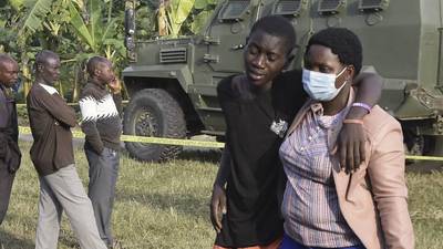 Students among at least 37 killed in Uganda school attack by extreme militant group 