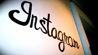 Instagram, now with added news, sails through the flak