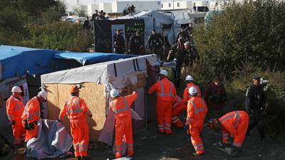 Calais ‘Jungle’ demolition begins as migrants leave