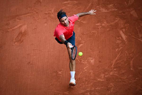 French Open: Roger Federer recovers composure to advance