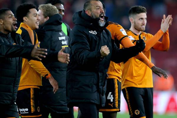 Wolves move closer to Premier League return despite red cards