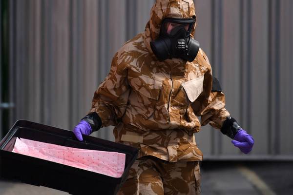 UK police in protective suits investigate latest Novichok poisoning