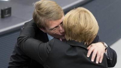 Angela Merkel  is under fire as inner circle seek rich pickings elsewhere