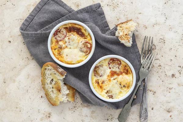 Baked eggs with chorizo, cream and Parmesan