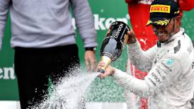 Perfectly judged race sees Lewis Hamilton take chequered flag