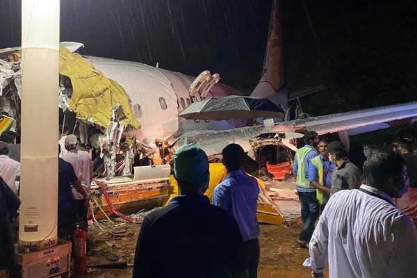 At least 16 dead after Air India plane breaks in two in Kerala
