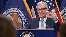 Fed raises rates by a half point as central banks enter new phase