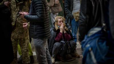 Ukrainians torn over whether to escape or hunker down as Russia invades
