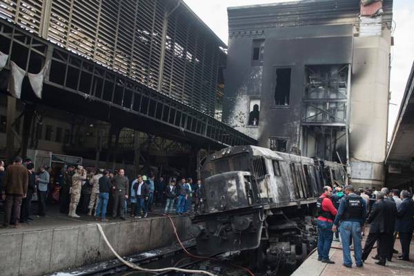 At least 20 killed, 43 injured in crash and fire at Cairo train station