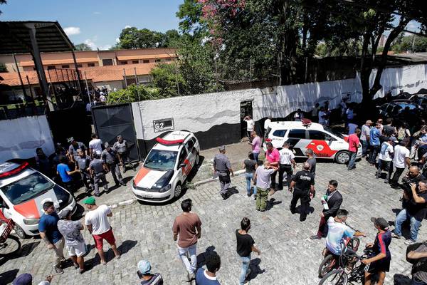 Ten dead including two gunmen after school shooting in Brazil