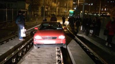 Luas service disrupted by car on track