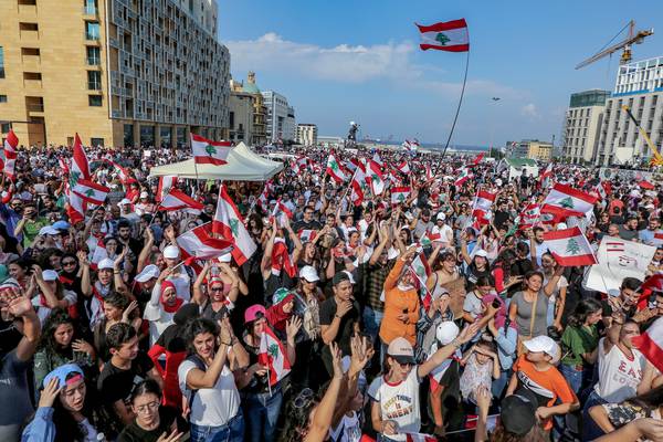 Protesters in Lebanon taste first victory with resignation of four ministers