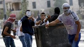 Analysis: Palestinian attacks stoke fears of  third intifada