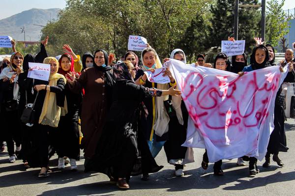 Taliban accused of beating women protesters after suicide bombing of a school in Afghanistan   