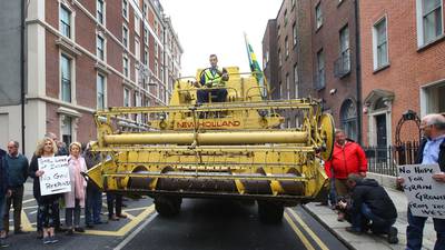 Protesting farmers block Dublin city traffic with combine