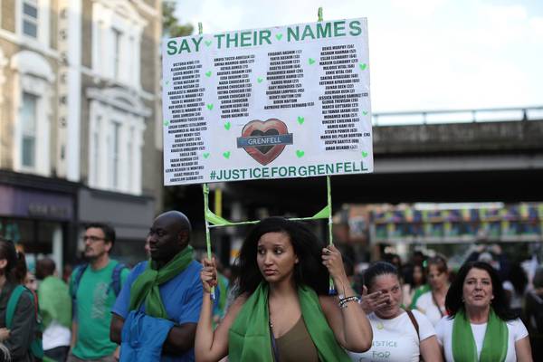 Silent procession marks first anniversary of Grenfell Tower blaze which claimed lives of 72 people