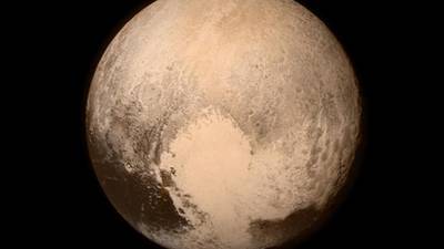 World gets close look at photographs of dwarf planet Pluto