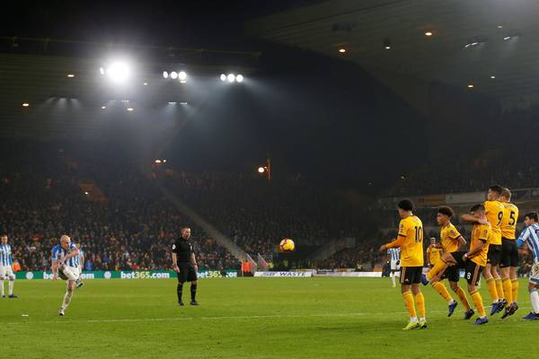 Mooy moves Huddersfield out of drop zone as Wolves slip further