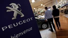 Peugeot posts record earnings despite sales dip
