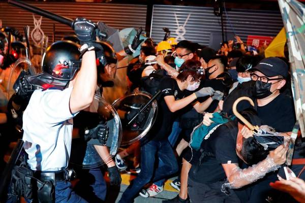 Fresh clashes in Hong Kong as protesters reach out to Chinese tourists