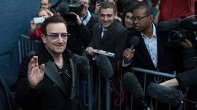 Stay on your bike Bono despite the fall