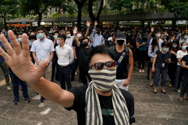 Hong Kong leader bans protesters from wearing masks