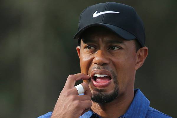 Tiger Woods withdraws from Dubai Classic with back injury