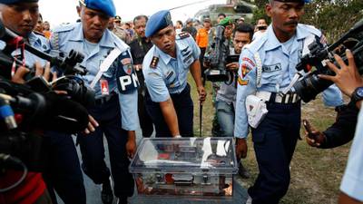 Two AirAsia black boxes found near plane wreckage in Java sea