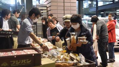 Survivors brace for another night of aftershocks in Japan