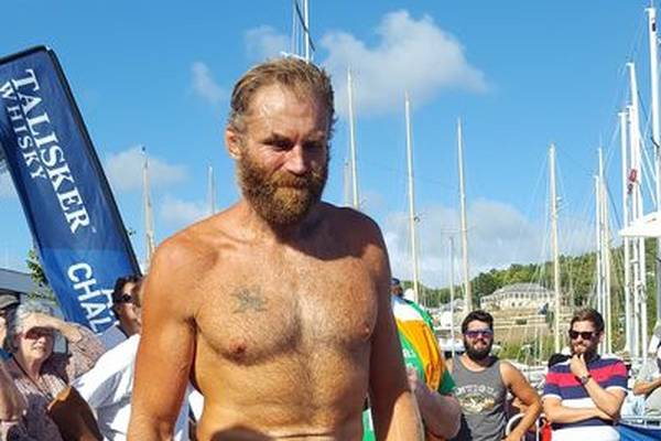Former rugby star completes epic row across Atlantic Ocean