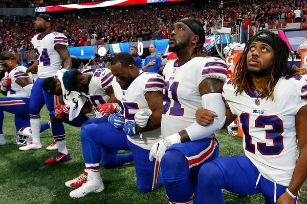 Some NFL players kneel during US anthem again