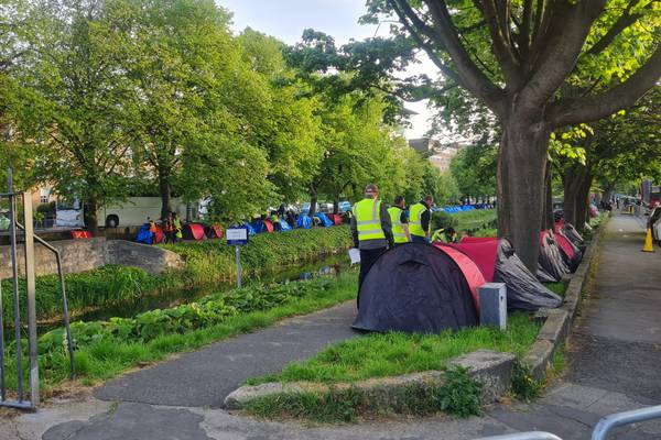 Operation begins to clear more than 100 asylum seeker tents along Grand Canal in Dublin