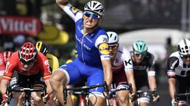 Kittel negotiates tightrope for another stage win