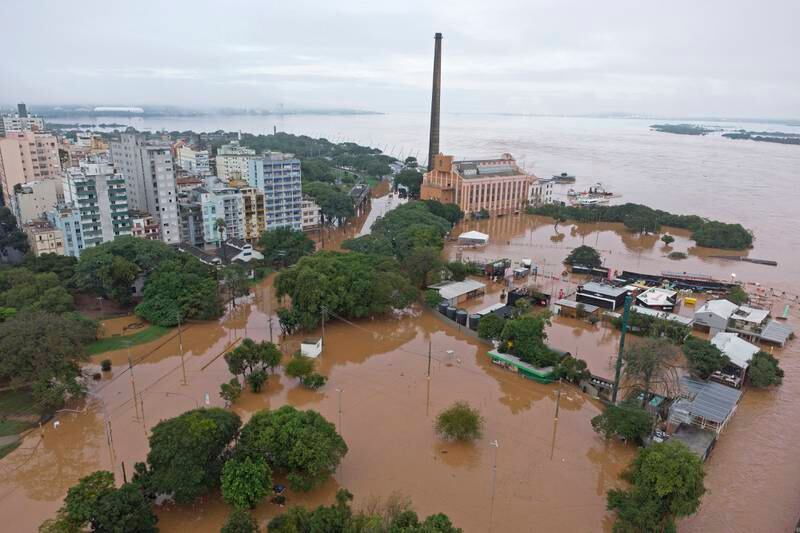 Rising death toll from rains in Brazil as floods destroy roads and bridges