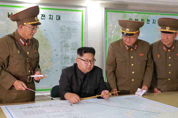 Kim Jong-un backs away from plan to attack Guam