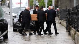 Godfather theme played as remains of Tony Felloni taken from church after Dublin funeral
